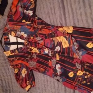 One piece, fashion Nova, multi colored , worn once.